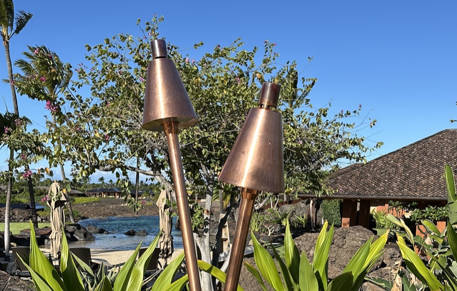 Copper tiki torches installed at a Kona, Hawaii resort